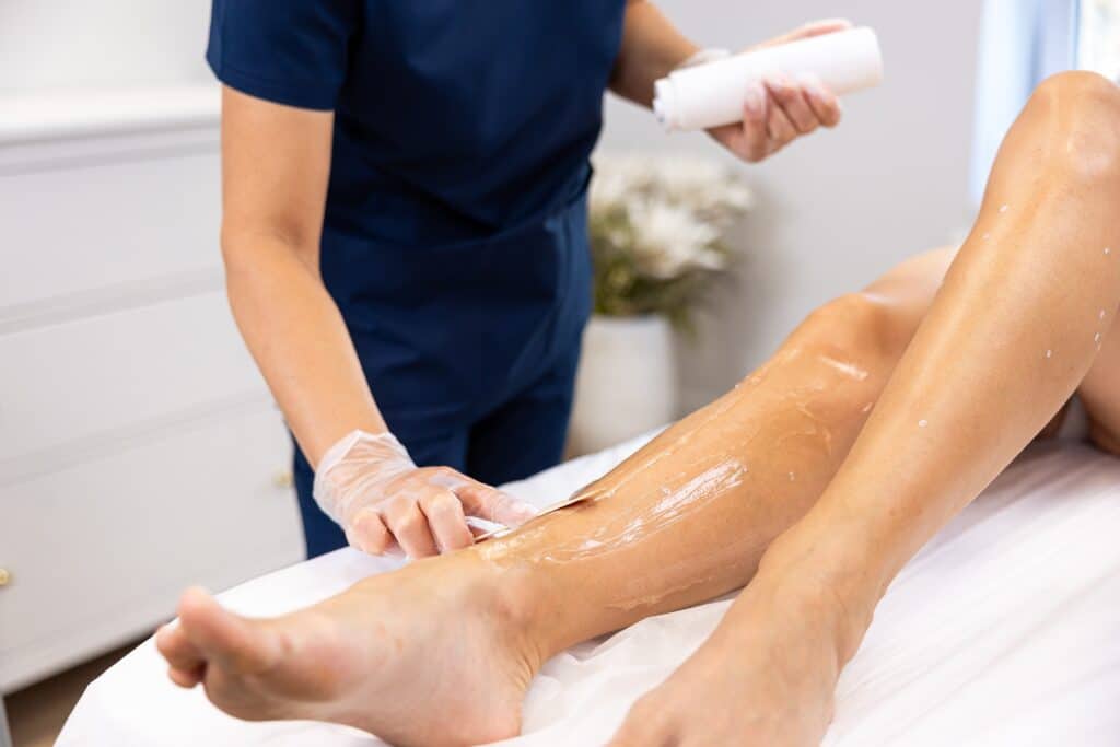 Professional,Leg,Waxing,Treatment,At,A,Beauty,Spa,,With,A